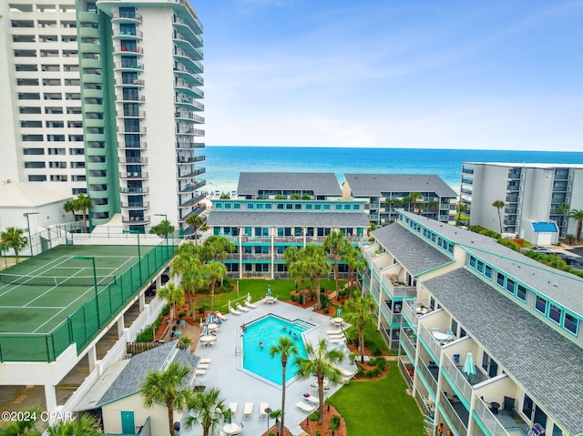 birds eye view of property with a water view