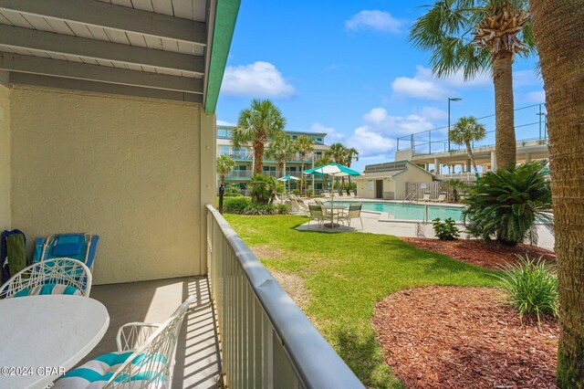 balcony with a community pool