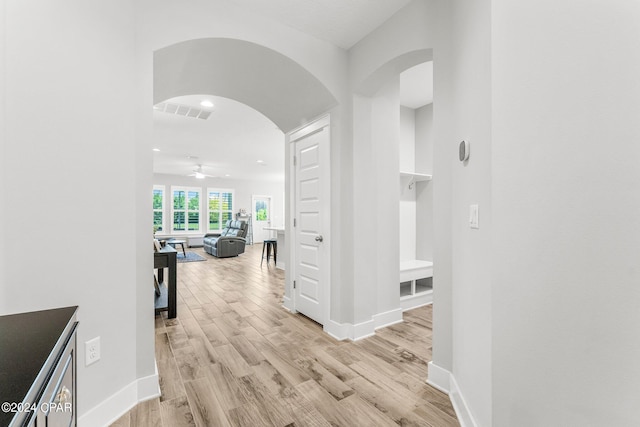 corridor featuring light hardwood / wood-style floors