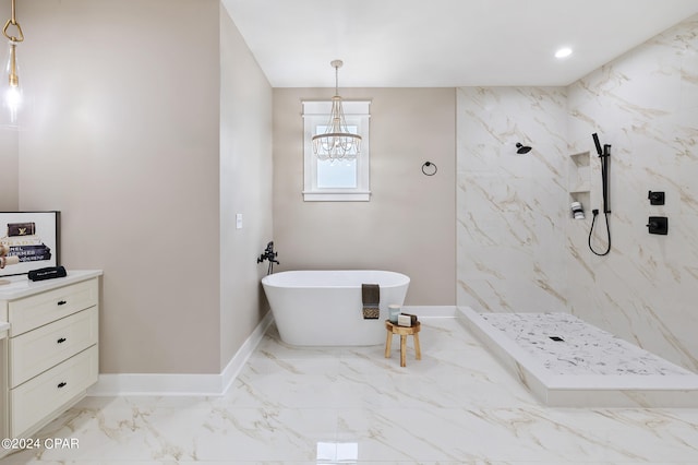 full bathroom featuring marble finish floor, a freestanding tub, a marble finish shower, and baseboards