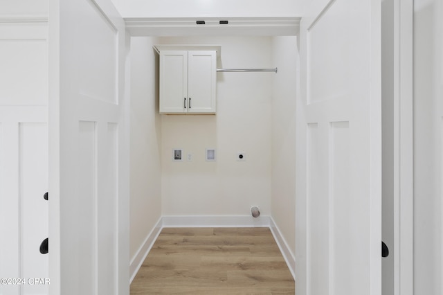 laundry area with washer hookup, cabinet space, electric dryer hookup, light wood-type flooring, and baseboards