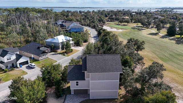 aerial view with a water view, a residential view, and golf course view