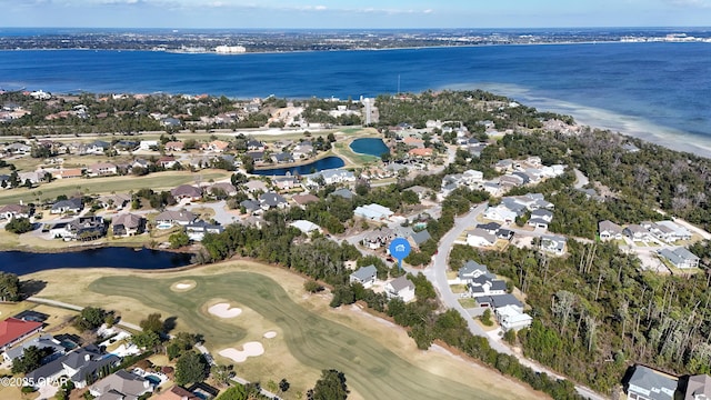 bird's eye view featuring view of golf course, a water view, and a residential view