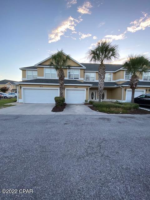 view of property featuring a garage