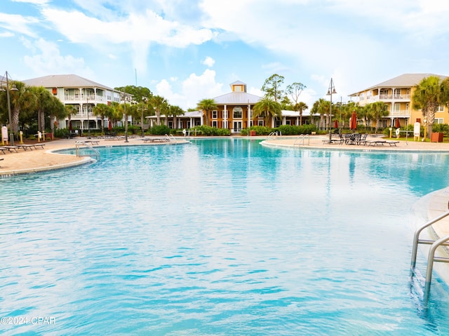 8700 Front Beach Rd Unit 4104, Panama City Beach, FL 32407 - community pool featuring a patio
