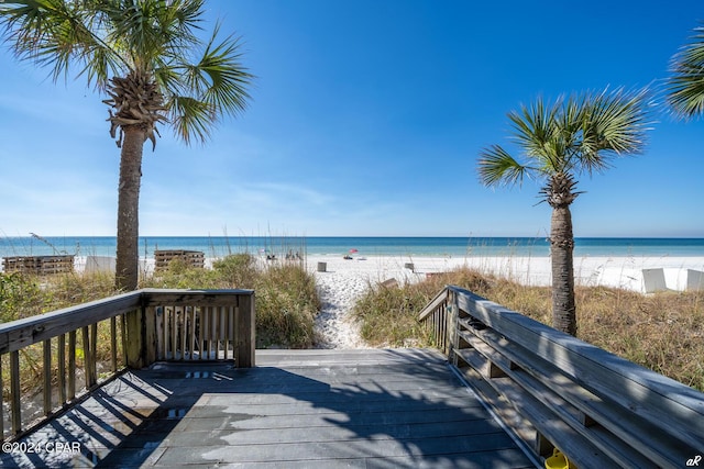 property view of water featuring a beach view