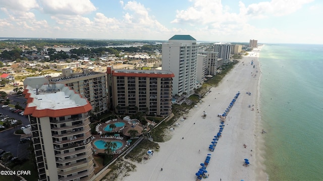 aerial view with a water view and a view of the beach