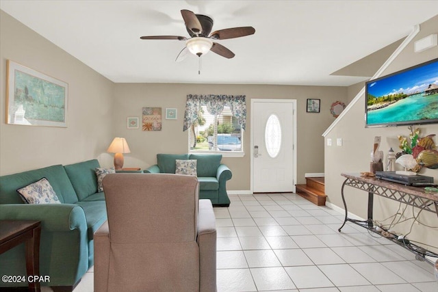 living room featuring ceiling fan and light tile patterned flooring