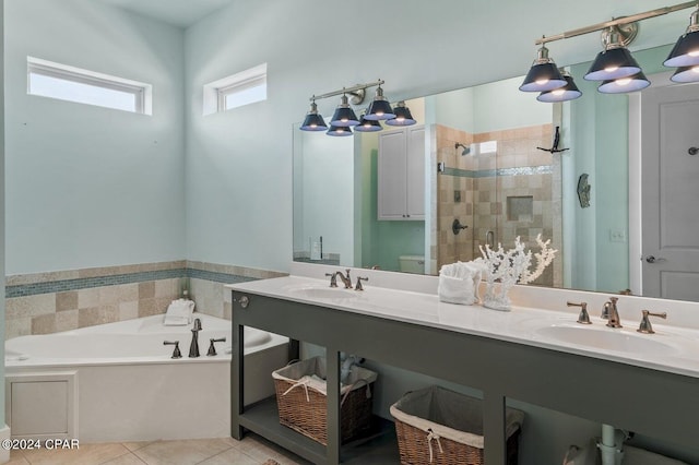 bathroom with independent shower and bath, tile patterned floors, and double sink vanity