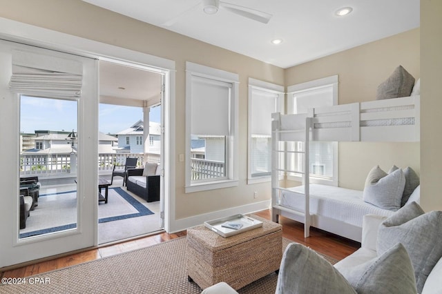 interior space featuring hardwood / wood-style floors and ceiling fan