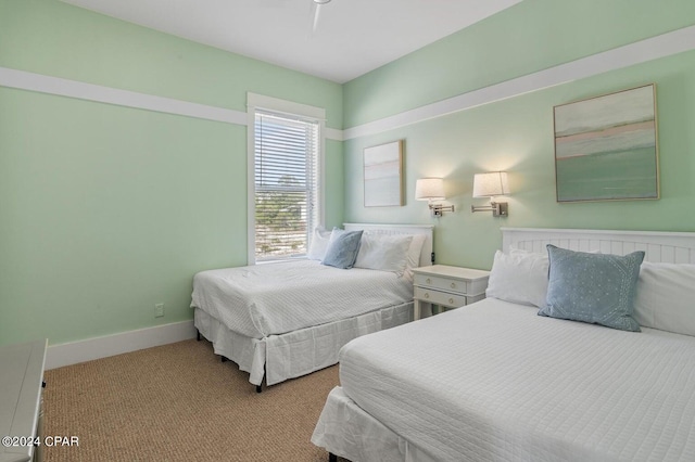 bedroom featuring carpet flooring and ceiling fan