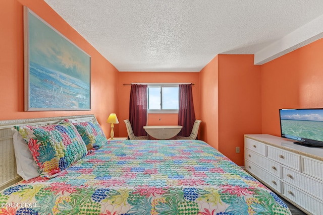 bedroom featuring a textured ceiling