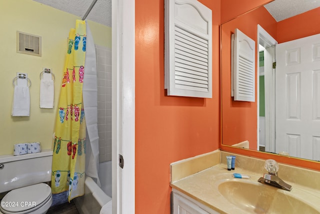 full bathroom with vanity, toilet, a textured ceiling, and shower / bath combination with curtain