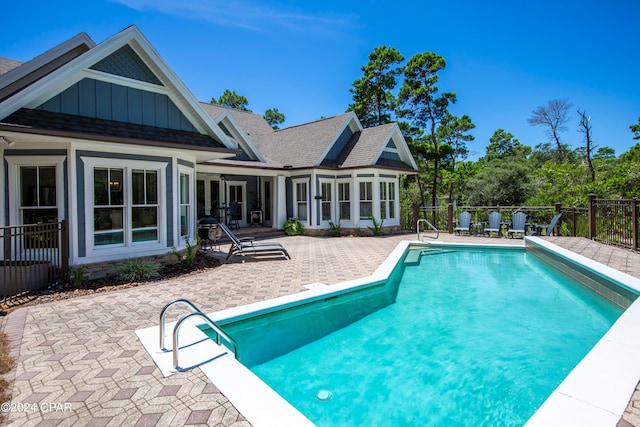 view of pool featuring a patio