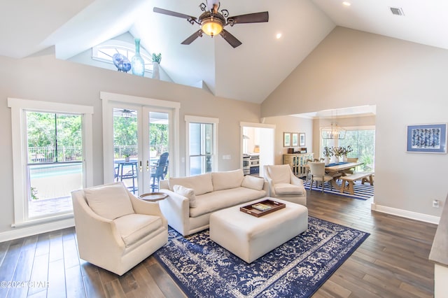 living room featuring ceiling fan, high vaulted ceiling, french doors, and dark hardwood / wood-style floors