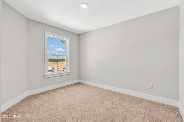 kitchen with white cabinetry, hanging light fixtures, stainless steel appliances, and light hardwood / wood-style floors