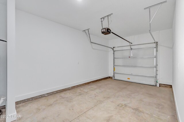 bedroom with light wood-type flooring, a barn door, ceiling fan, and crown molding