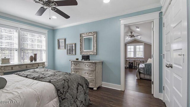 bedroom with crown molding, vaulted ceiling, ceiling fan, and dark hardwood / wood-style floors