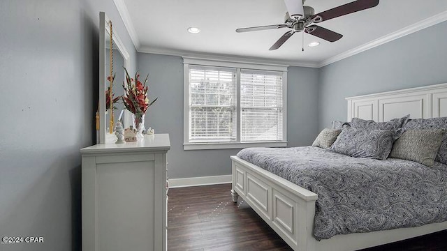 bedroom featuring dark wood-type flooring, ceiling fan, and ornamental molding