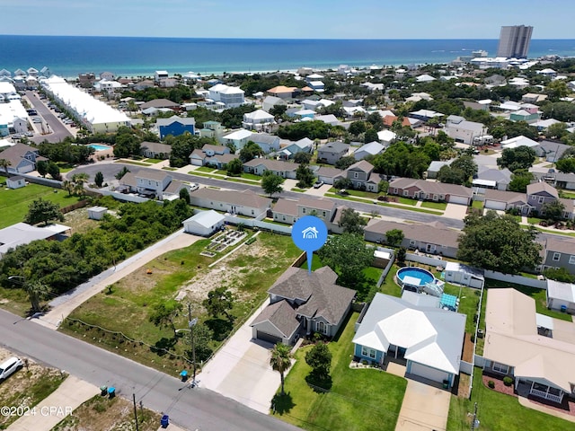 bird's eye view with a water view