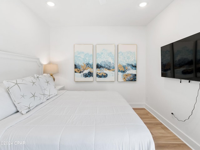 bedroom featuring hardwood / wood-style floors