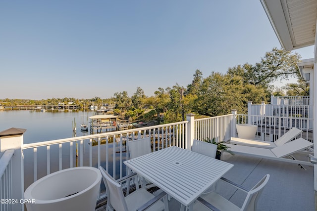 244 E 3rd Pl, Panama City, FL 32401 - balcony featuring a water view and a boat dock