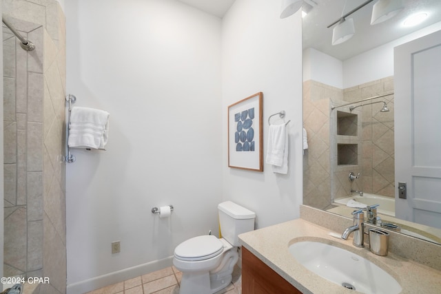 bathroom with tile patterned floors, vanity, and toilet