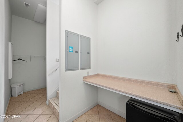 bathroom featuring tile patterned floors and electric panel