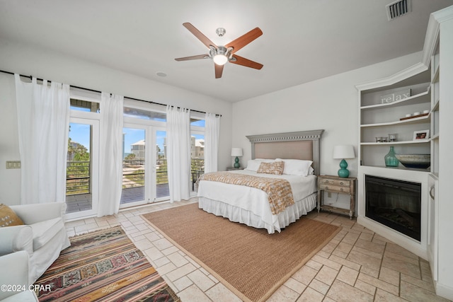 bedroom featuring access to exterior and ceiling fan