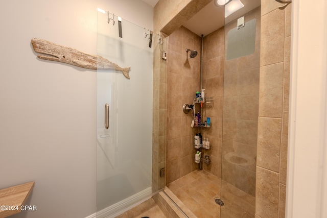 bathroom with an enclosed shower