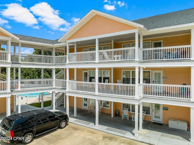 exterior space featuring a fenced in pool