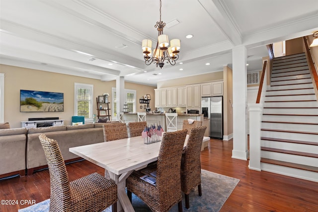 dining area featuring ornamental molding, dark hardwood / wood-style floors, an inviting chandelier, and beamed ceiling