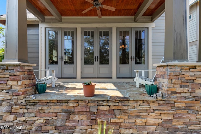 entrance to property with french doors and ceiling fan