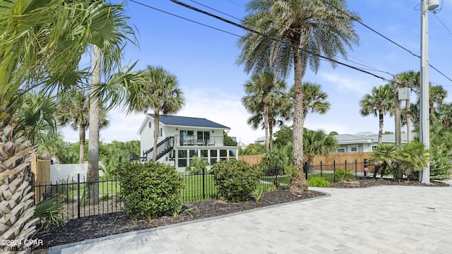 view of front of home with a balcony