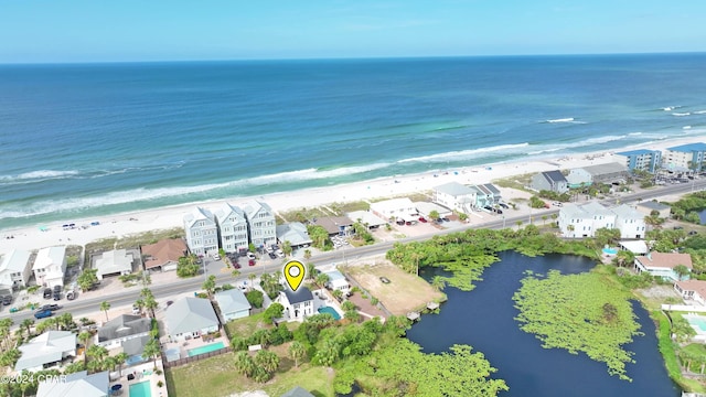 aerial view with a beach view and a water view