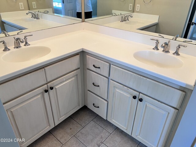 bathroom featuring vanity and tile patterned flooring