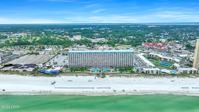 bird's eye view featuring a view of the beach and a water view