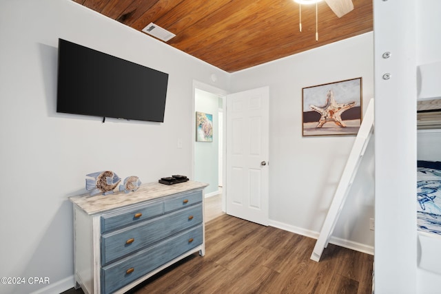 interior space featuring wood ceiling and dark hardwood / wood-style floors