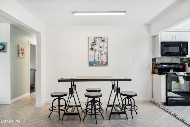 interior space featuring light parquet flooring