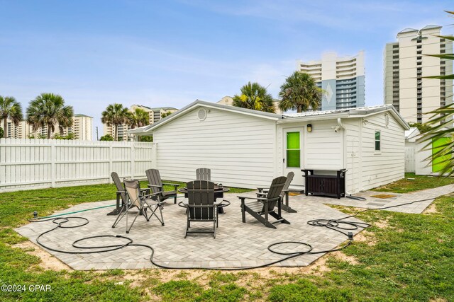 exterior space with an outdoor fire pit