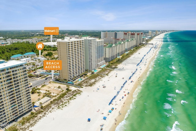 drone / aerial view with a view of the beach and a water view