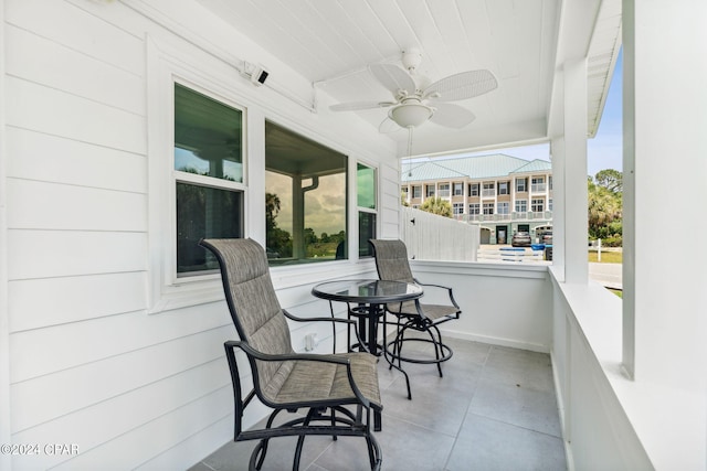 balcony featuring ceiling fan