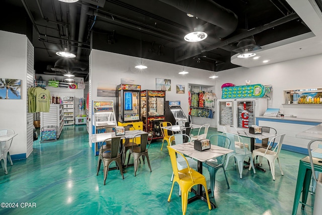 dining room featuring concrete floors