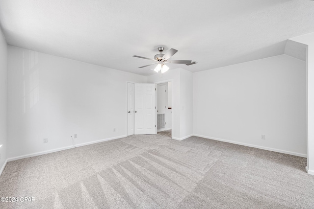 unfurnished bedroom featuring ceiling fan and light colored carpet