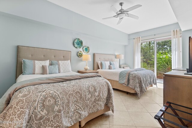 bedroom featuring ceiling fan, light tile patterned flooring, and access to outside