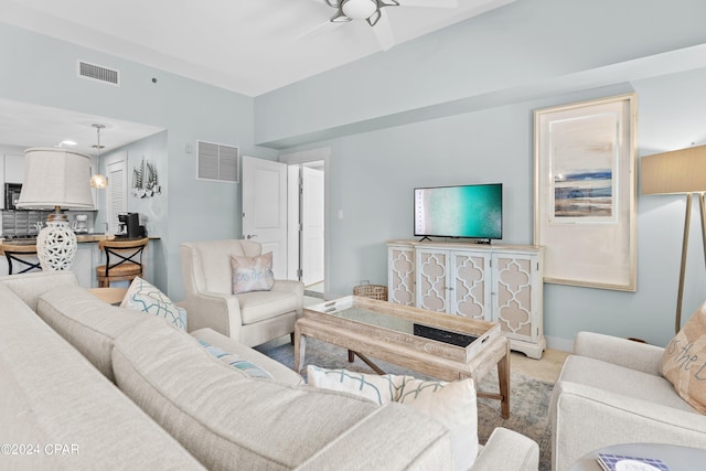 living room with ceiling fan