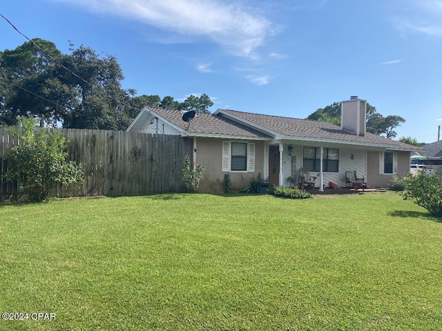 exterior space featuring a front yard