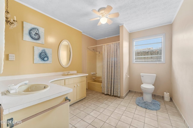 full bathroom with shower / bath combination with curtain, a textured ceiling, toilet, vanity, and ceiling fan