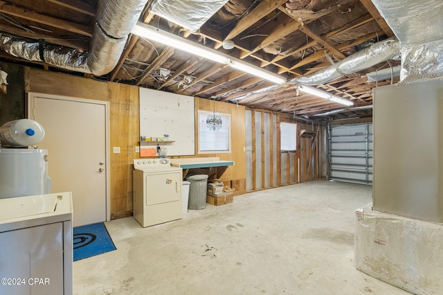 basement with washer / dryer and water heater