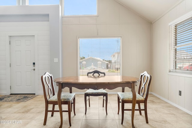 dining area with a healthy amount of sunlight and light tile patterned floors